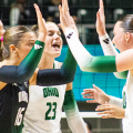 Ohio Volleyball team celebrates scoring a point in win against Morgan State