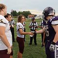 Federal Hocking and Millersport are meeting for the coin toss in center field before the game.