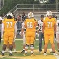 The Hamilton Township Rangers and the Amanda-Clearcreek players meet at midfield for the coin toss.