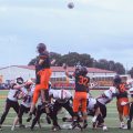 The Tigers try for a point after try, with the Senators trying to block the kick.