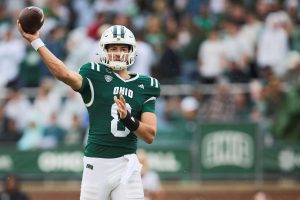 Ohio quarterback Nick Poulos throwing a pass
