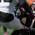 Cincinnati Bengals wide receiver Ja'marr Chase (1) is tackled during an NFL football game