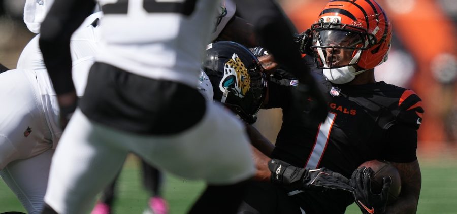 Cincinnati Bengals wide receiver Ja'marr Chase (1) is tackled during an NFL football game