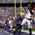 Cincinnati Bengals wide receiver Ja'marr Chase (1) scores a touchdown during the second half of an NFL football game