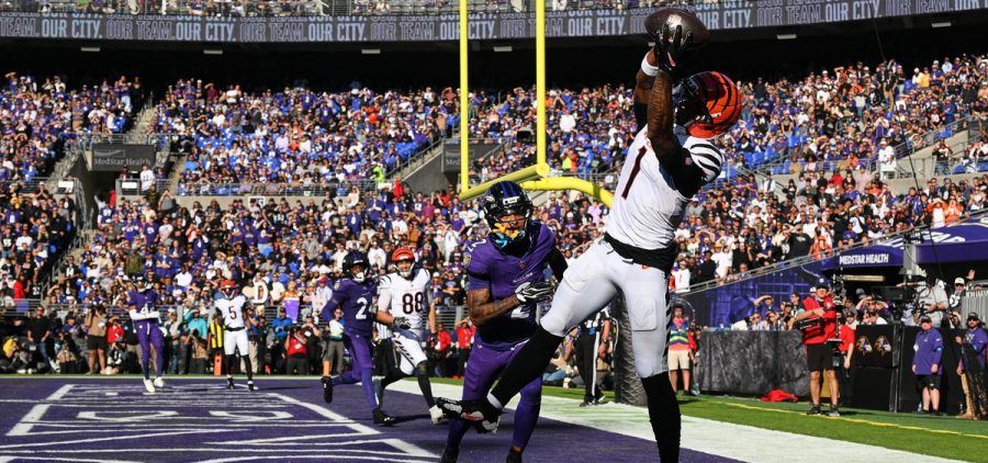 Cincinnati Bengals wide receiver Ja'marr Chase (1) scores a touchdown during the second half of an NFL football game