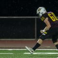 Berne Union defender celebrates after a sack against Fairfield Christian Academy.