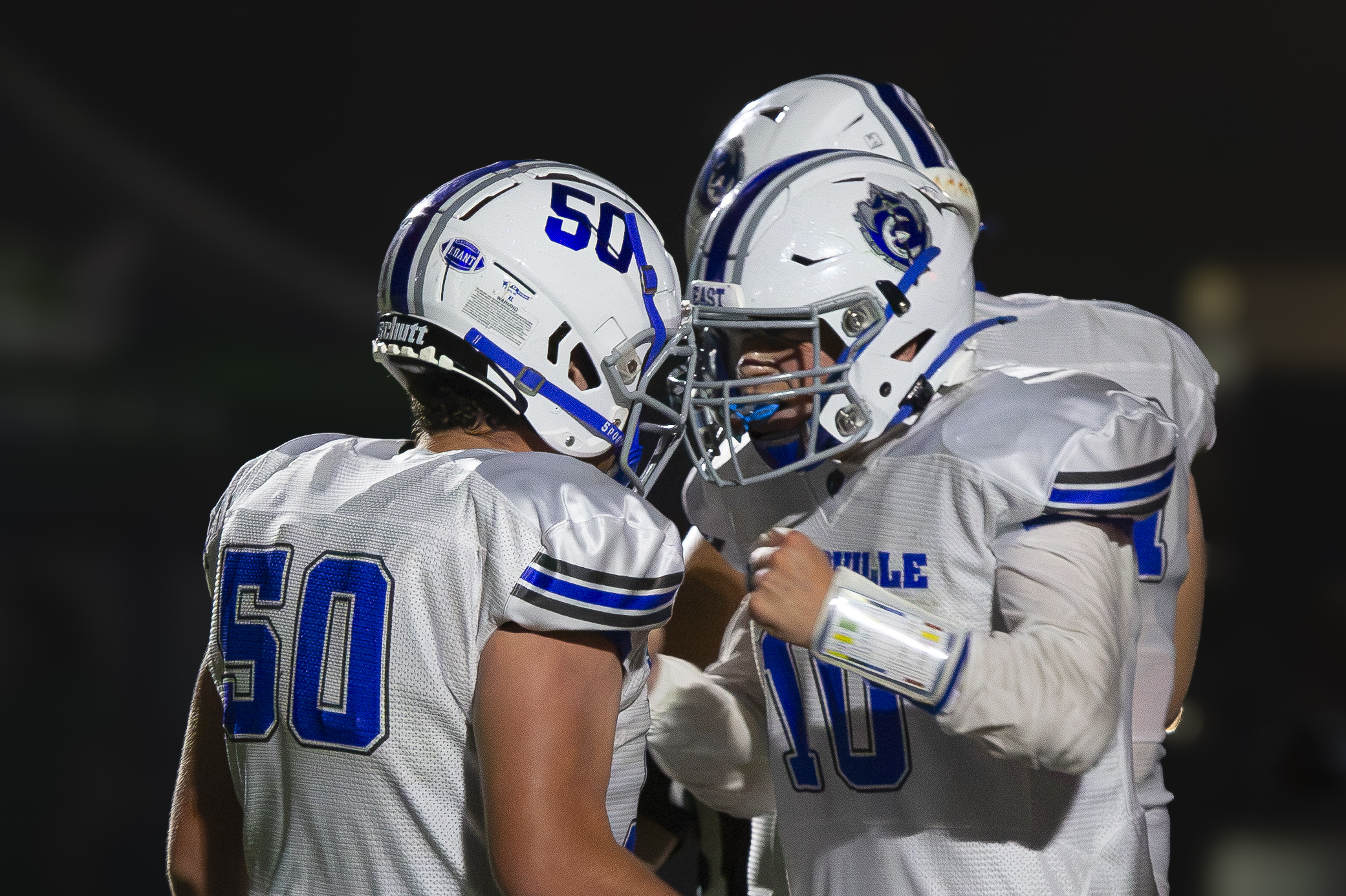 A Sciotoville East player is celebrating with their teammate