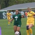 Ohio Soccer player dribbles past Kent State challenger in Ohio loss to Kent State