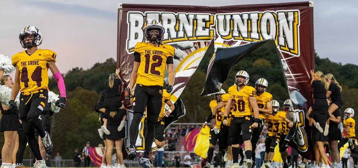 Berne Union players run out on the field to take on Fisher Catholic in MSL play.