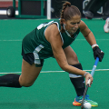 Ohio Field Hockey back Ava Hershberger passing the ball upfield against James Madison
