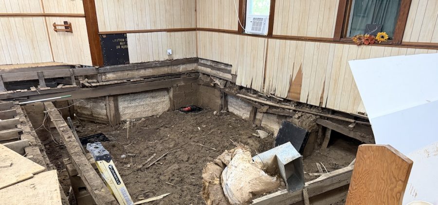 Much of the floor inside Community Church in Rutland has been ripped out because of flood damage, exposing the ground below.