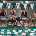 Ohio Swimming team diving into pool in meet against Illinois State