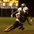 Beaver Eastern is running with the ball to get away from defenders