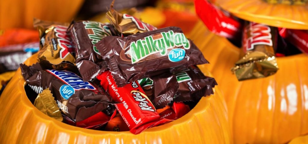 Ceramic Pumpkins hold Halloween candy.